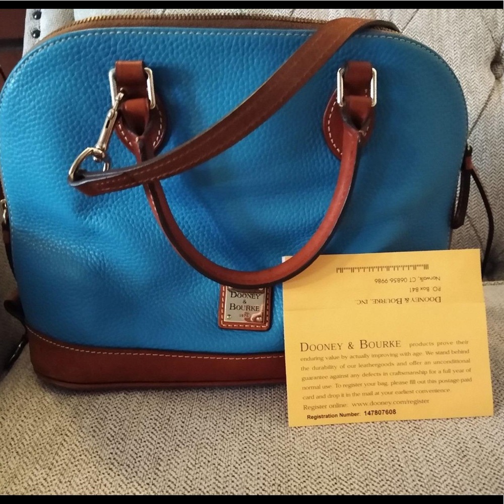 Authentic Dooney and Bourke blue and brown mildly used purse